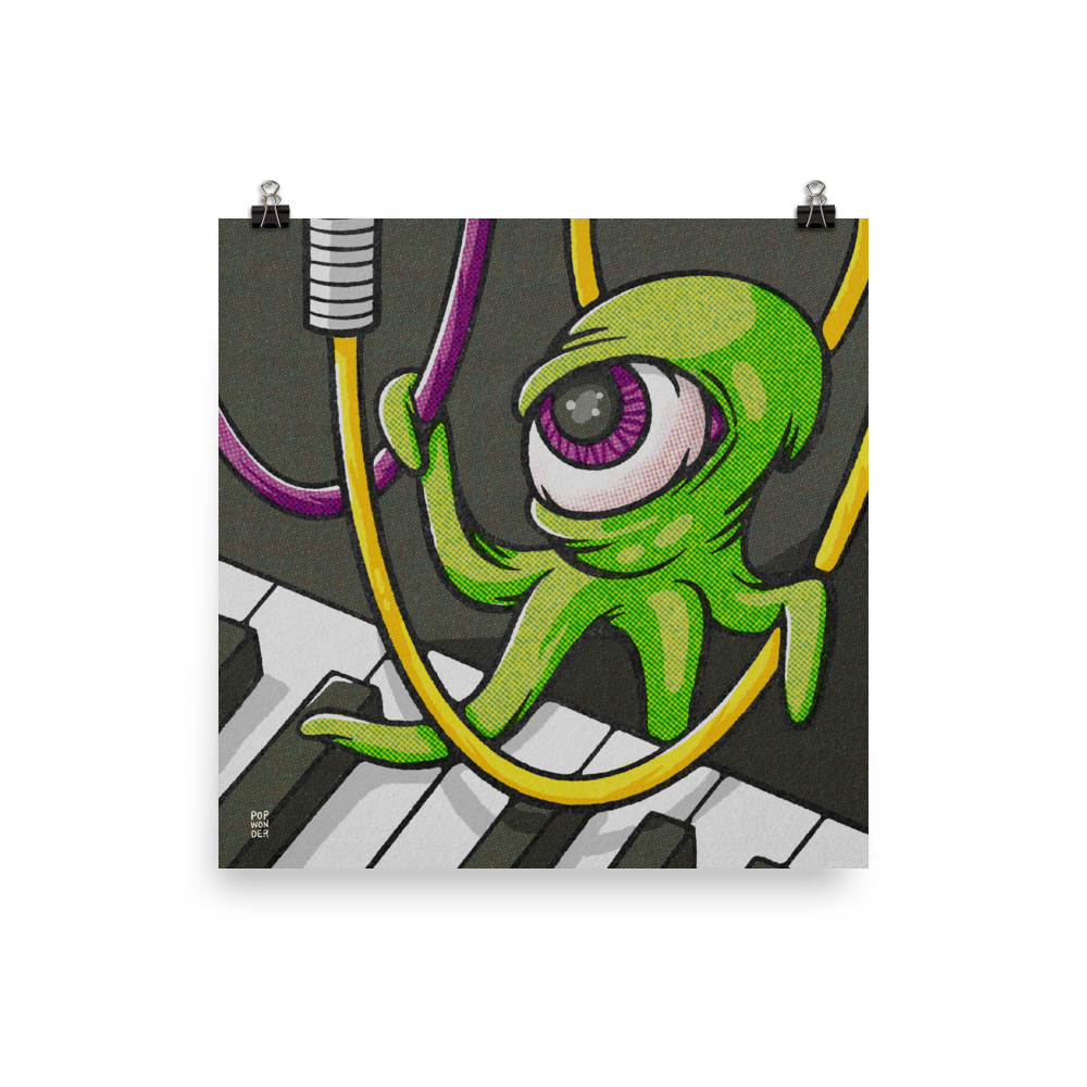 An octopus-like alien with one giant eyeball hangs from the patch cables of a synthesizer.